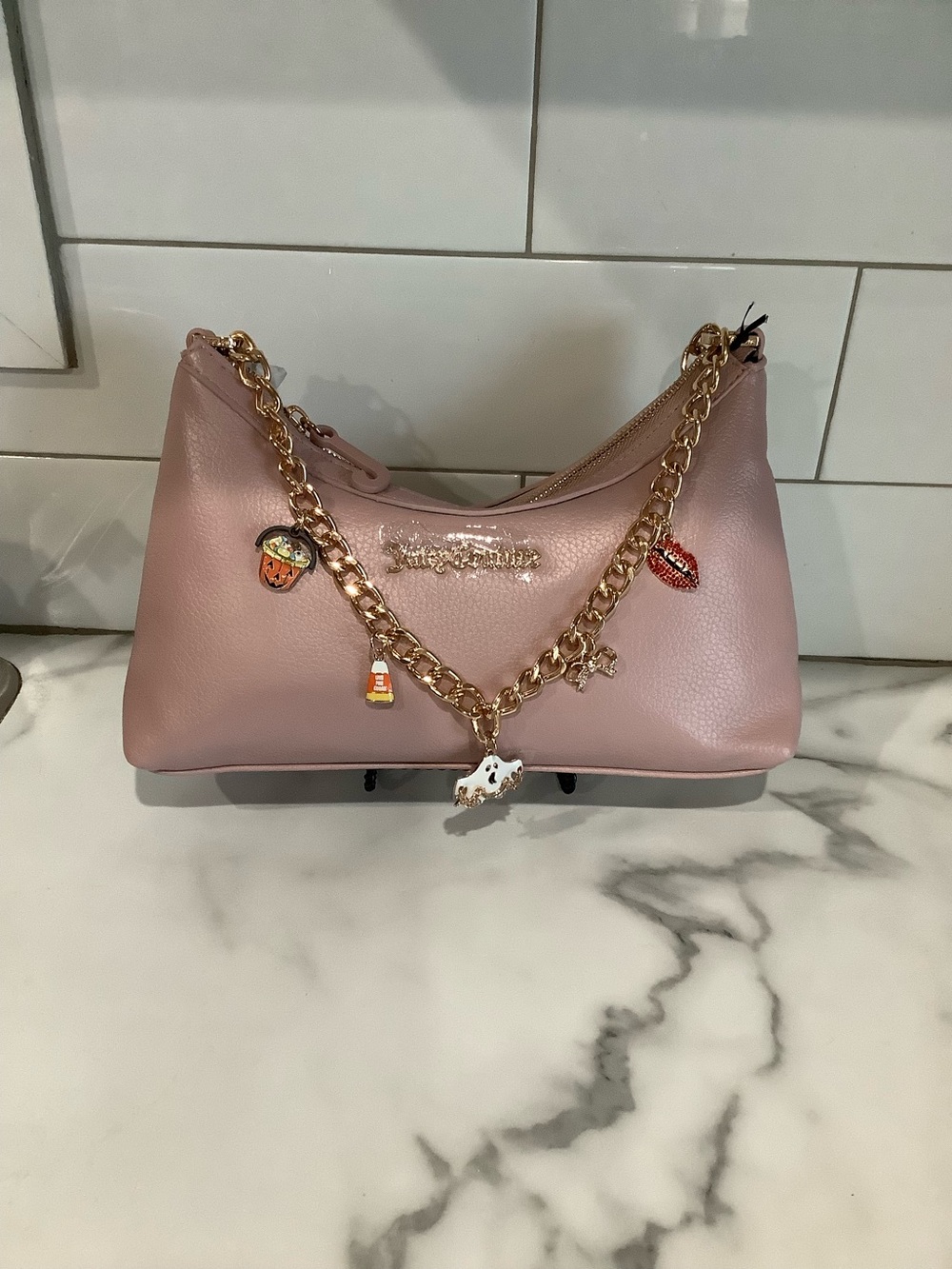 Juicy Couture Dusty Pink Leather Shoulder Bag with Gold Halloween Charm Chain